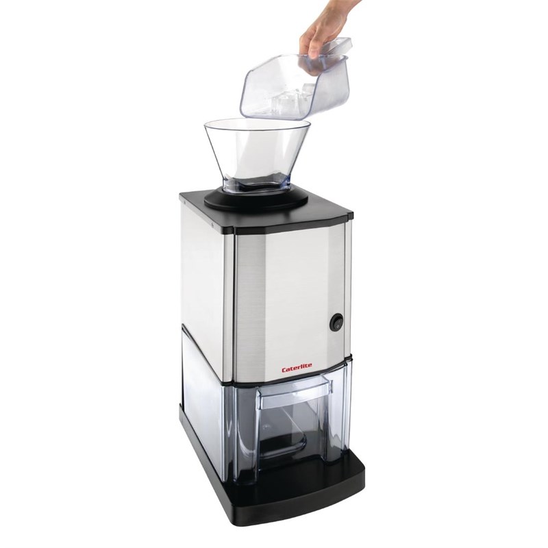 a hand pouring liquid into a glass container