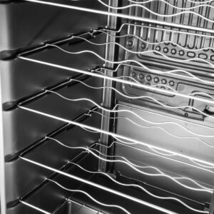 a close up of a metal oven