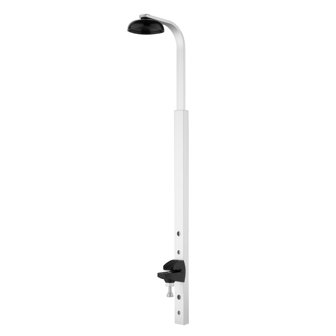 een witte paal met een zwart licht